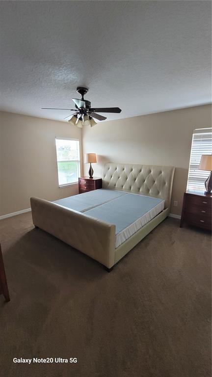 1040 Marcello Boulevard Kissimmee, FL 34746 - Photo 9 of 24 a living room with furniture and a chandelier