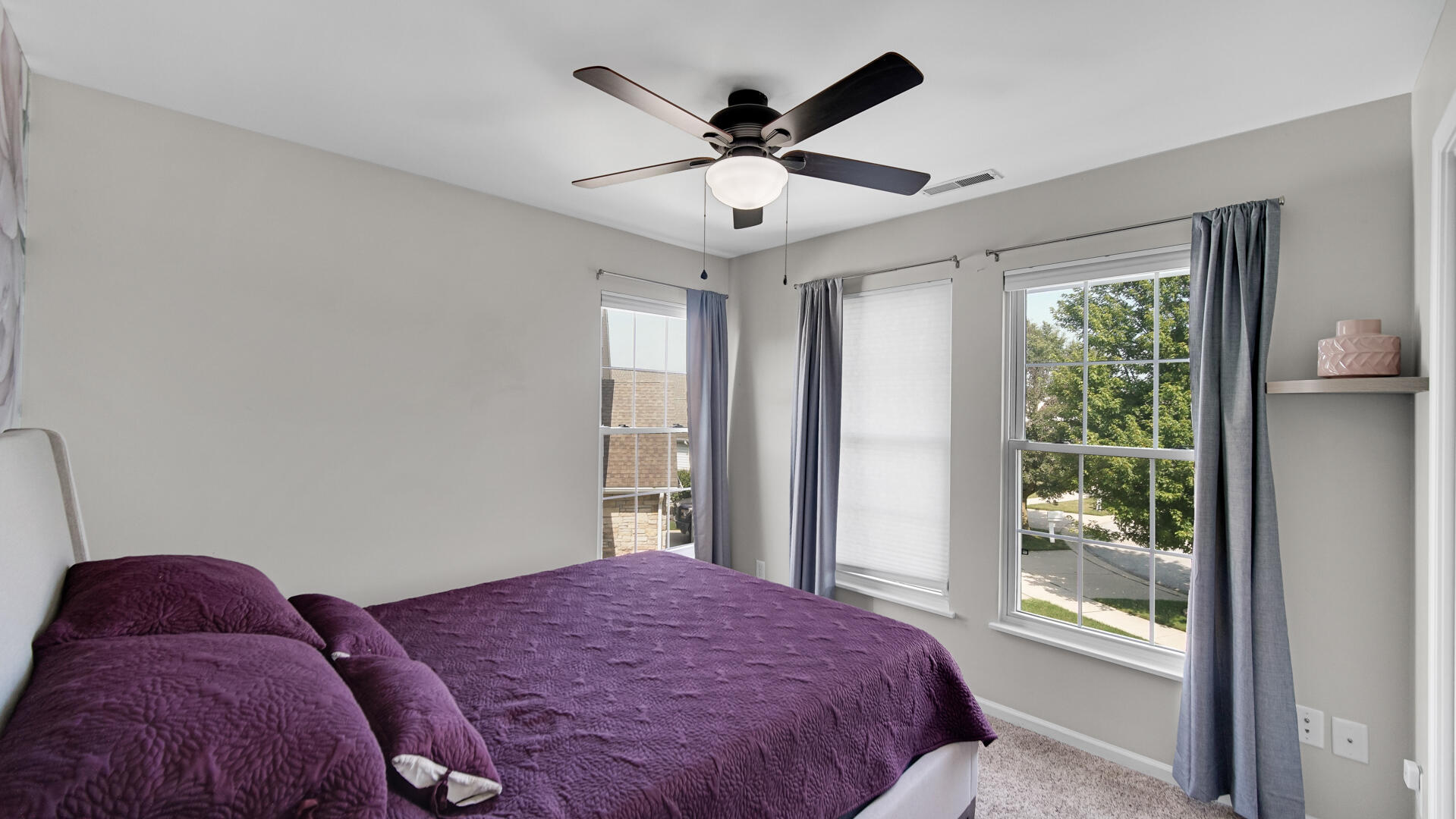 10300 Illinois Street Crown Point, IN 46307 - Photo 14 of 29 a bedroom with a large bed and a window