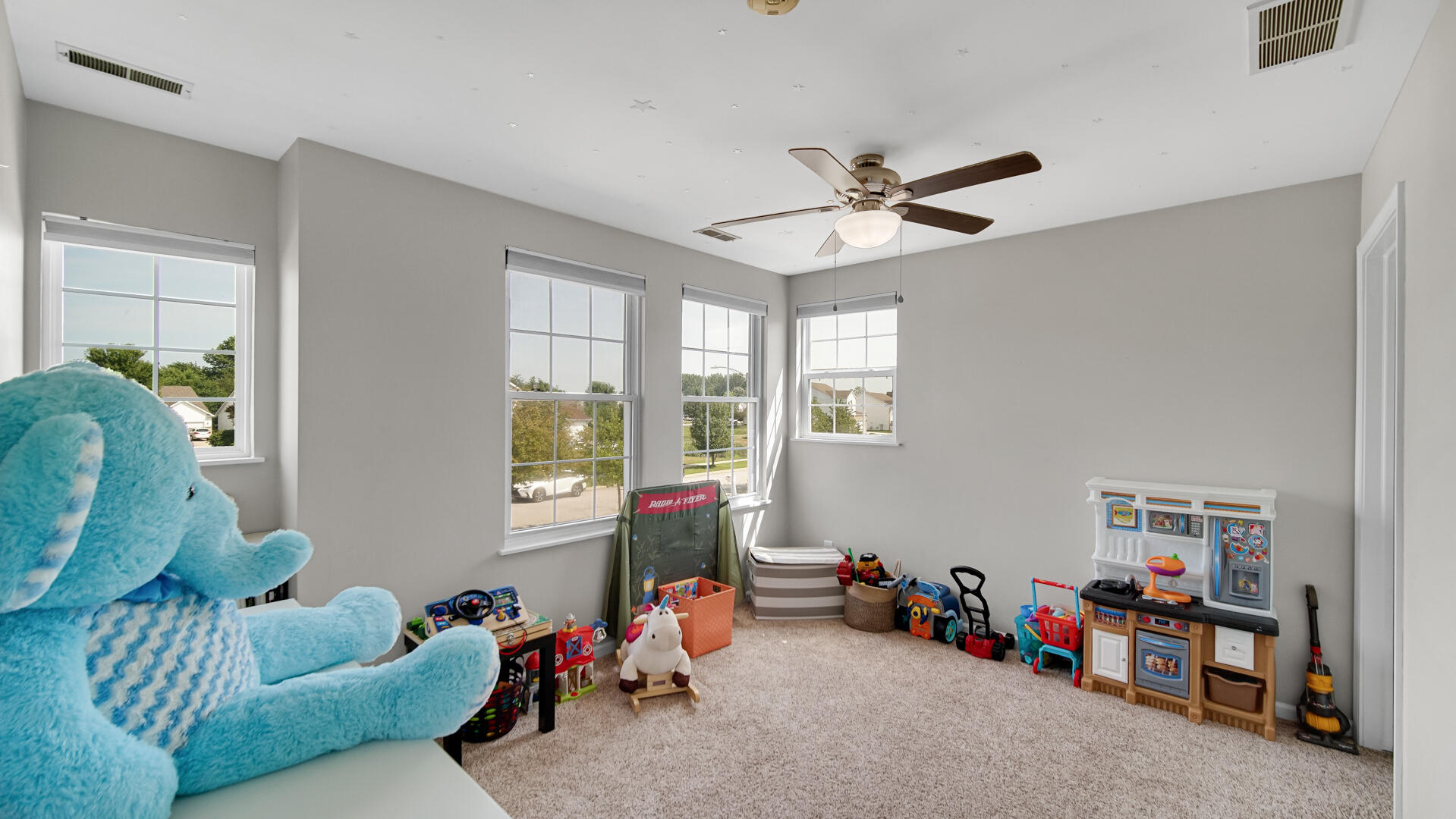 10300 Illinois Street Crown Point, IN 46307 - Photo 16 of 29 a living room with furniture toys and a window