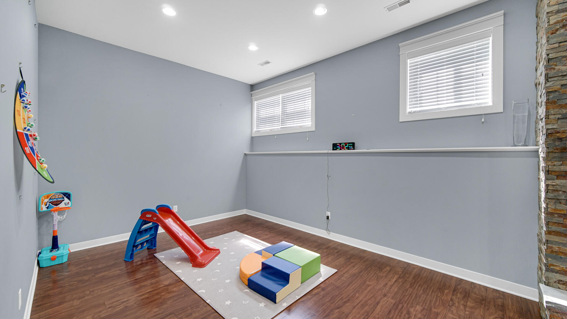 10300 Illinois Street Crown Point, IN 46307 - Photo 19 of 29 a room with wooden floor and a window