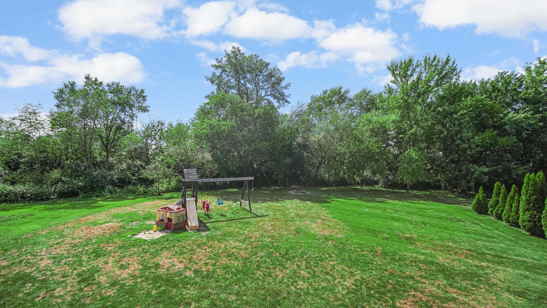 10300 Illinois Street Crown Point, IN 46307 - Photo 28 of 29 a view of a sitting area in a backyard