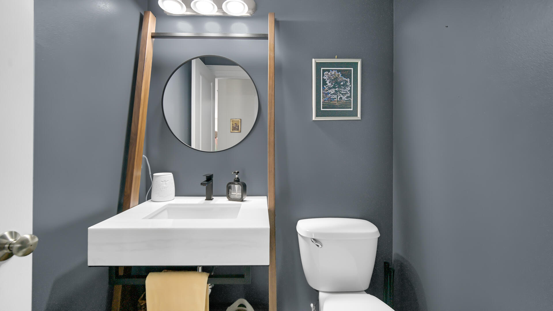 10300 Illinois Street Crown Point, IN 46307 - Photo 9 of 29 a bathroom with a toilet sink and mirror