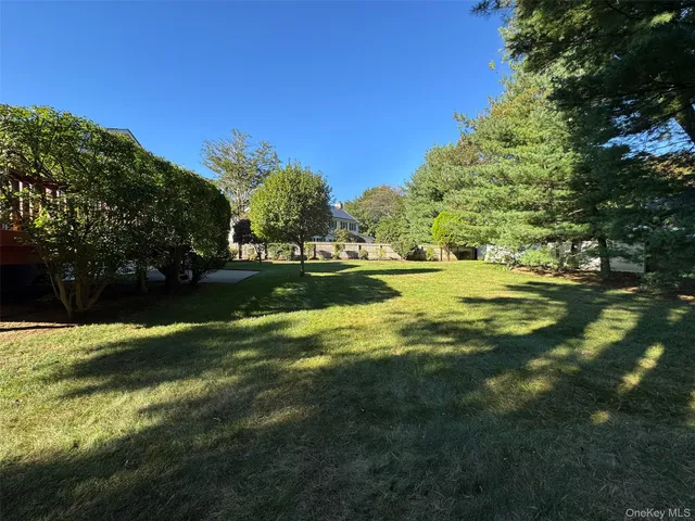 a view of a golf course with a lake