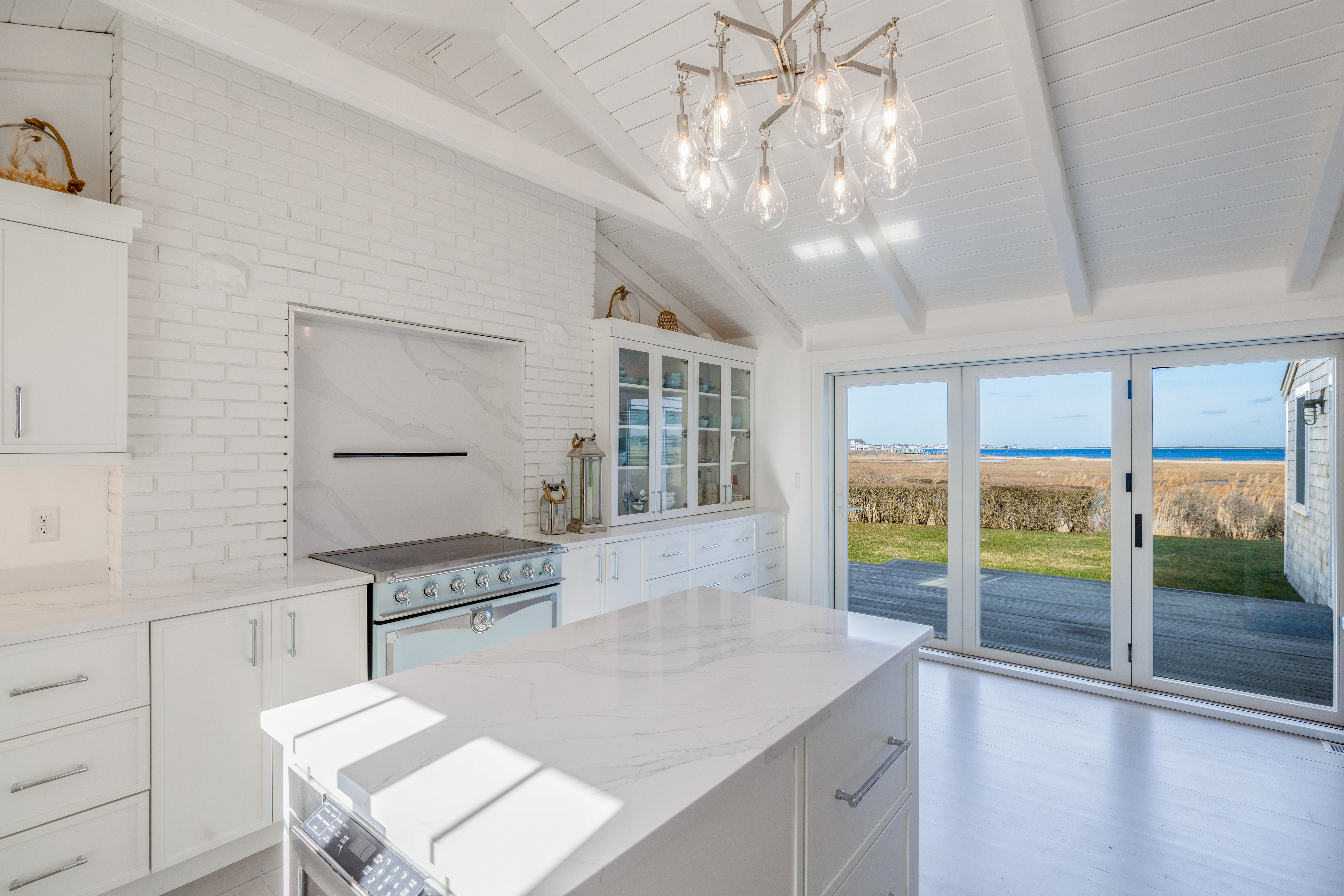 6 Harbor Terrace Nantucket, MA 02554 - Photo 7 of 18 a kitchen that has a lot of cabinets in it