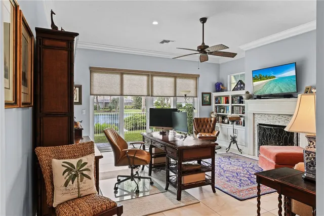 a view of a livingroom with furniture and a fireplace