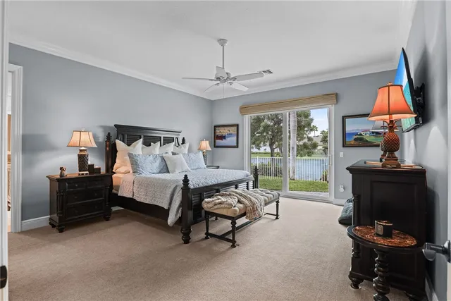 a bedroom with furniture and a lamp