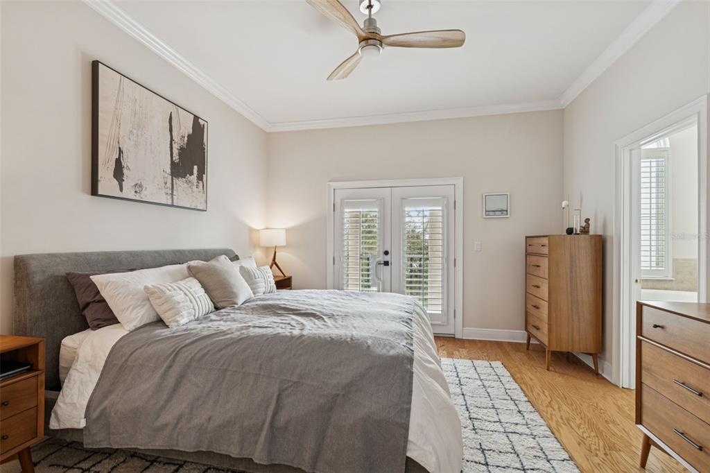 1001 South Rome Avenue, Unit 9 Tampa, FL 33606 - Photo 13 of 25 a bedroom with a bed and a walk in closet