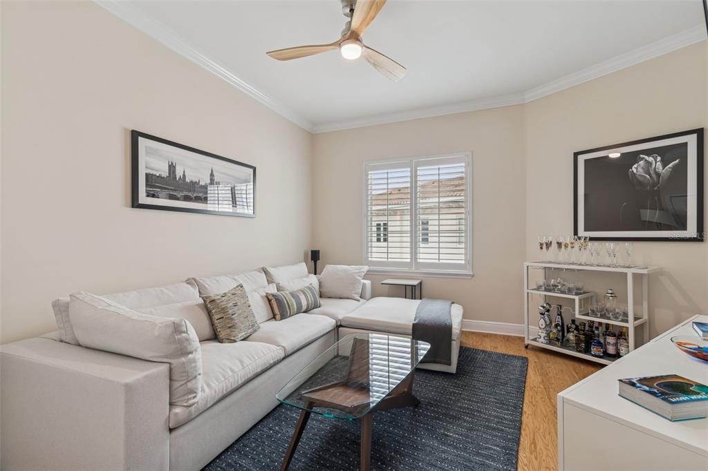 1001 South Rome Avenue, Unit 9 Tampa, FL 33606 - Photo 16 of 25 a living room with furniture and wooden floor