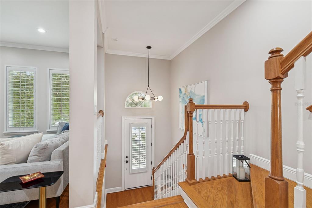 1001 South Rome Avenue, Unit 9 Tampa, FL 33606 - Photo 5 of 25 a living room with furniture and a wooden floor