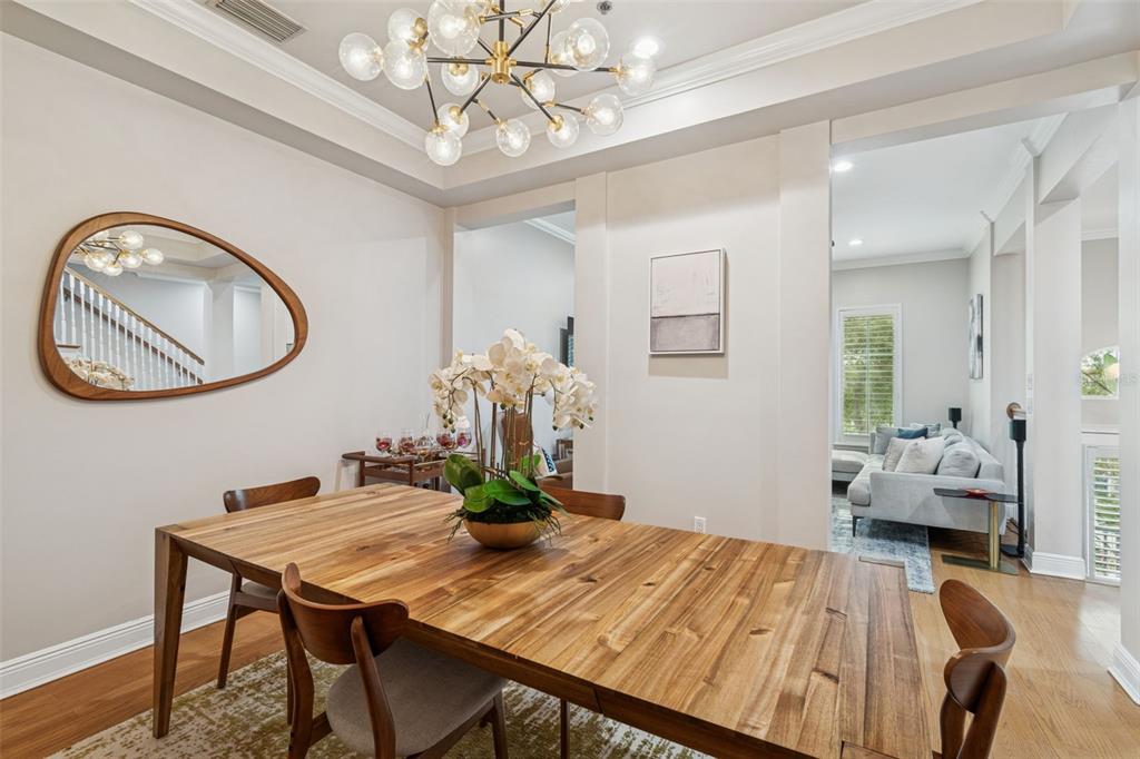 1001 South Rome Avenue, Unit 9 Tampa, FL 33606 - Photo 9 of 25 a dining room with a table and chairs