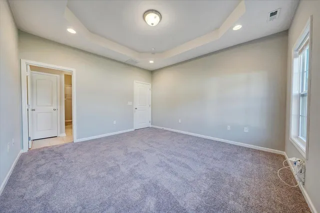 an empty room with a natural light