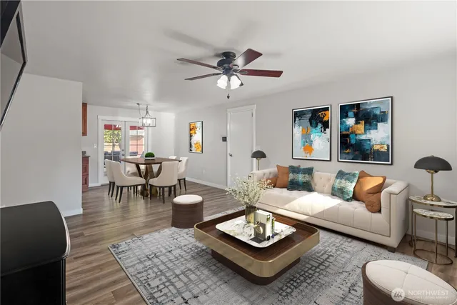 a living room with furniture and a rug