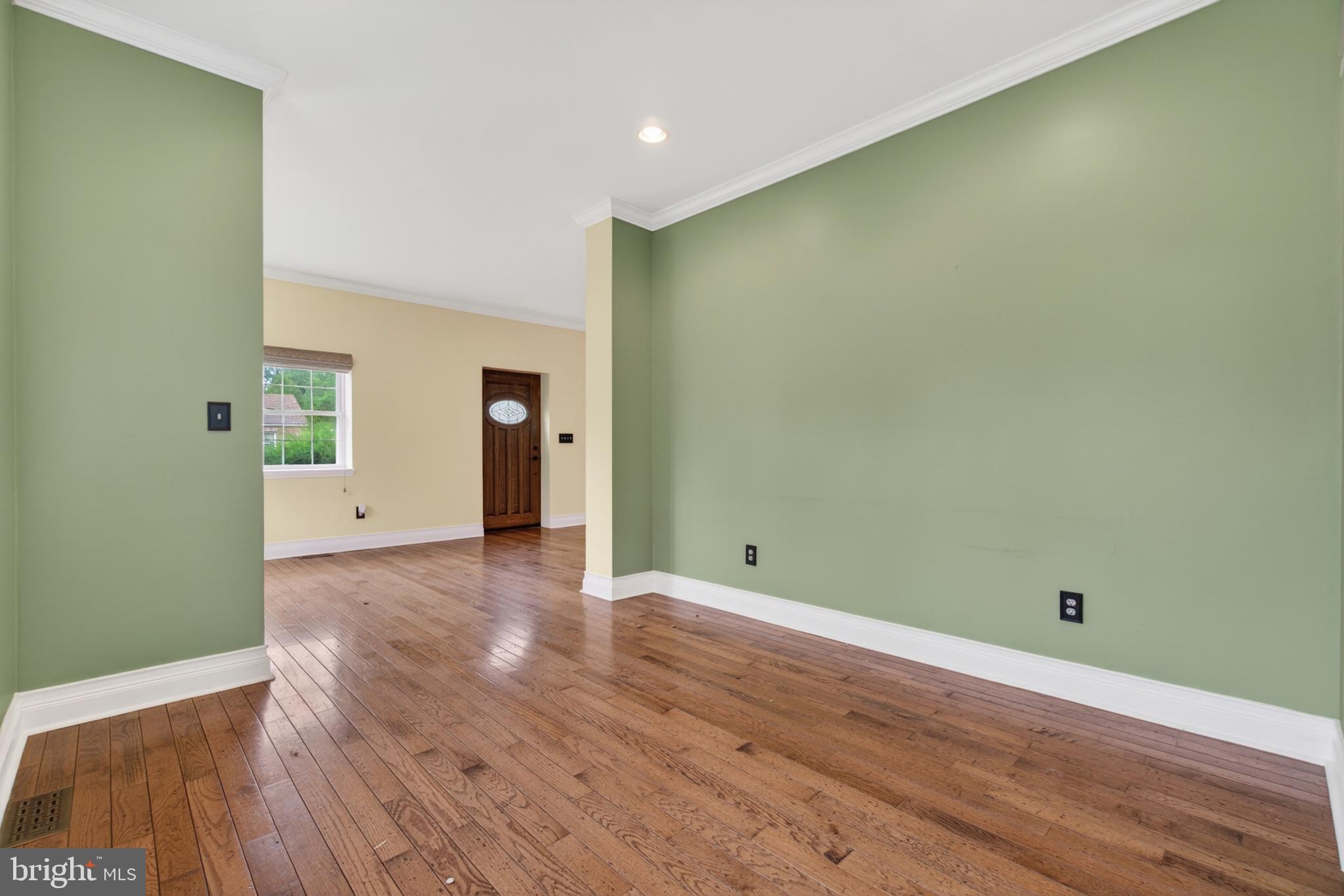 117 State Avenue Lindenwold, NJ 08021 - Photo 18 of 58 an empty room with wooden floor and windows