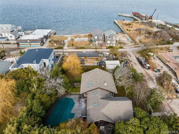 an aerial view of a house with outdoor space
