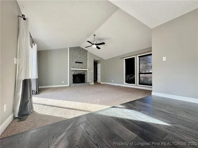 a view of a livingroom with a fireplace