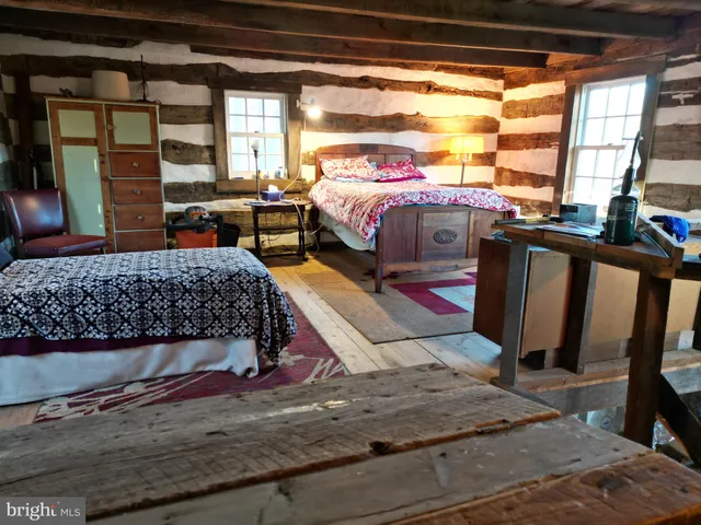 a back view of a house with a yard