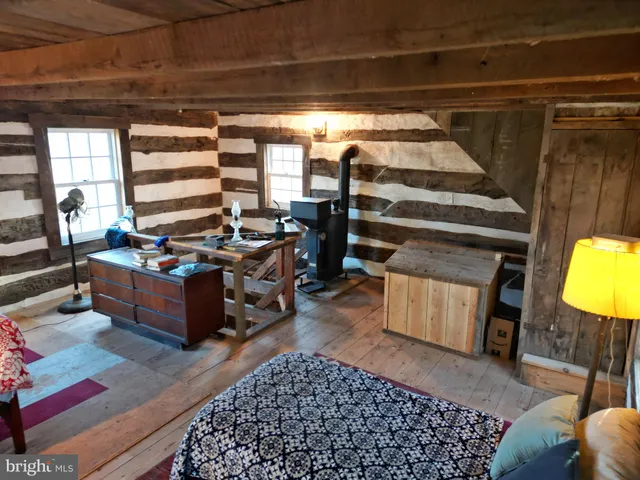 a view of a lake in middle of forest