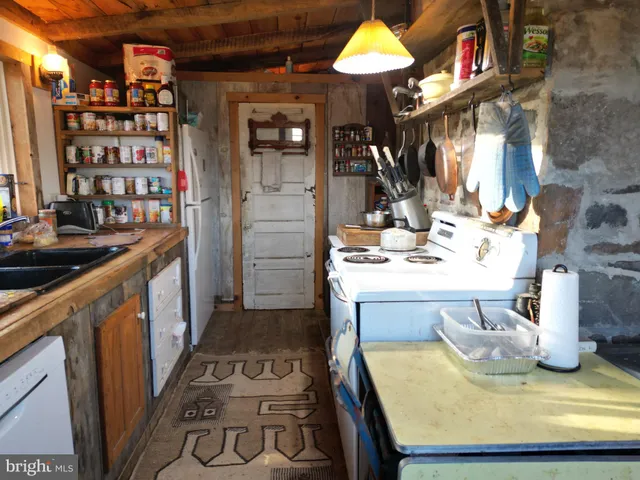 a bed room with a bed and a window