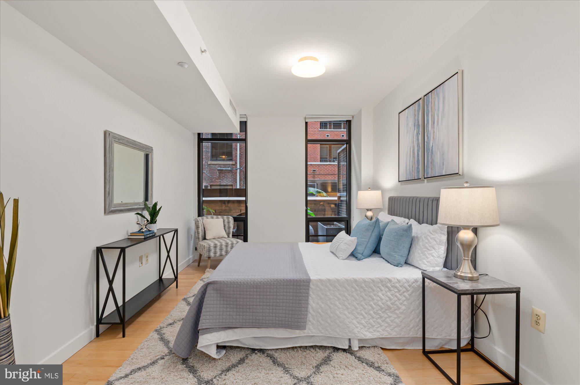 912 F Street Northwest, Unit T01 Washington, DC 20004 - Photo 14 of 32 Spacious bedroom with floor to ceiling windows