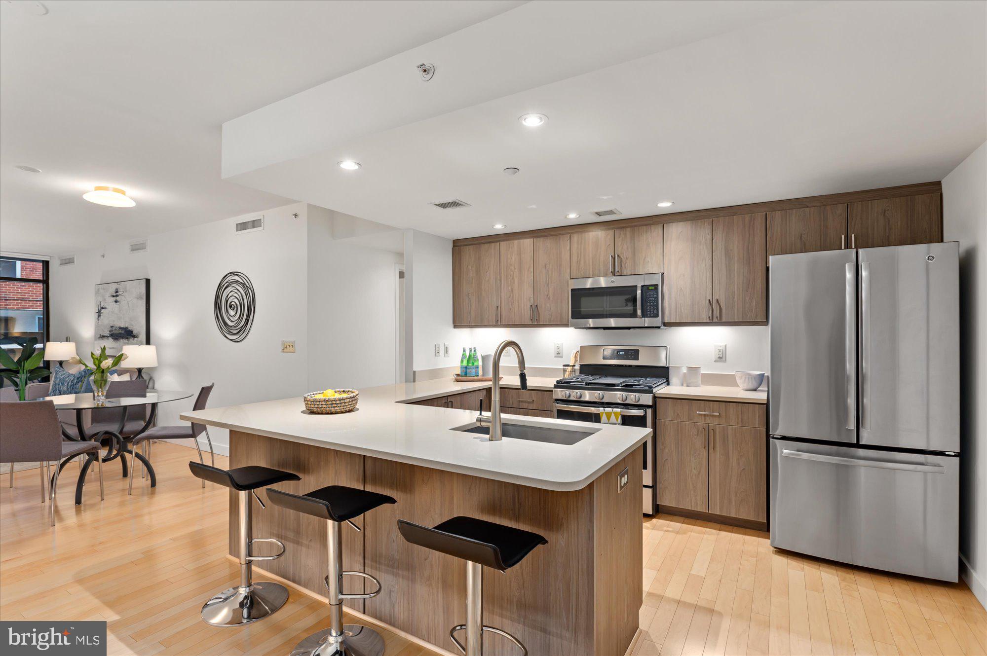 912 F Street Northwest, Unit T01 Washington, DC 20004 - Photo 5 of 32 Updated kitchen