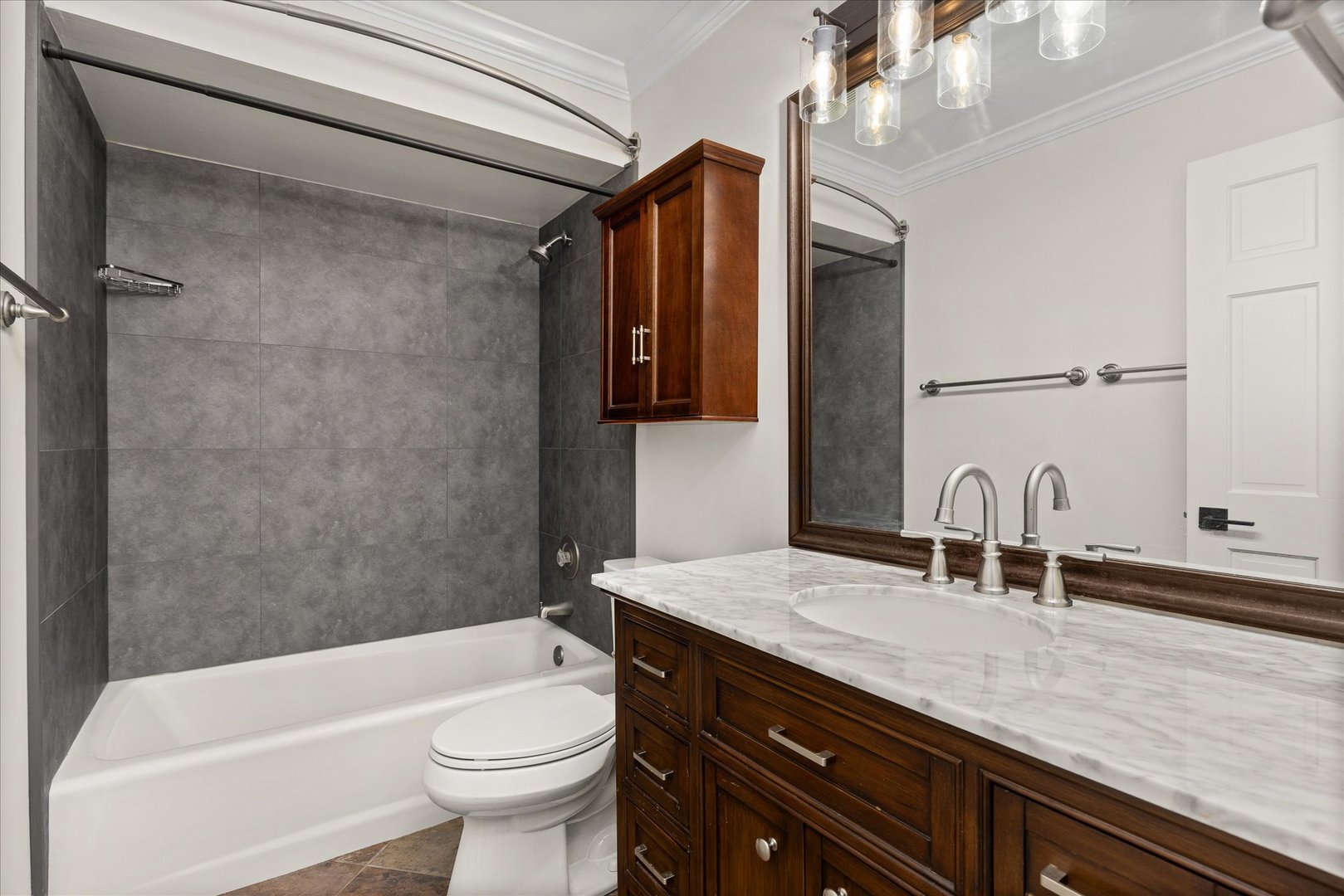 7610 West 26th Street, Unit 6 North Riverside, IL 60546 - Photo 14 of 21 a bathroom with a granite countertop sink a toilet a mirror and bathtub