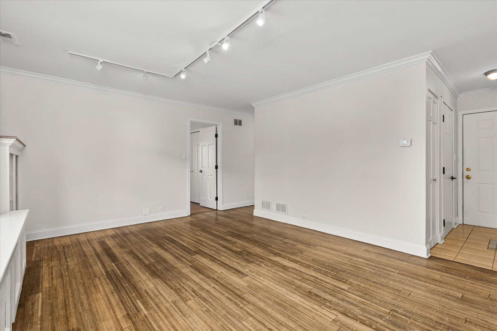 7610 West 26th Street, Unit 6 North Riverside, IL 60546 - Photo 5 of 21 a view of an empty room with wooden floor