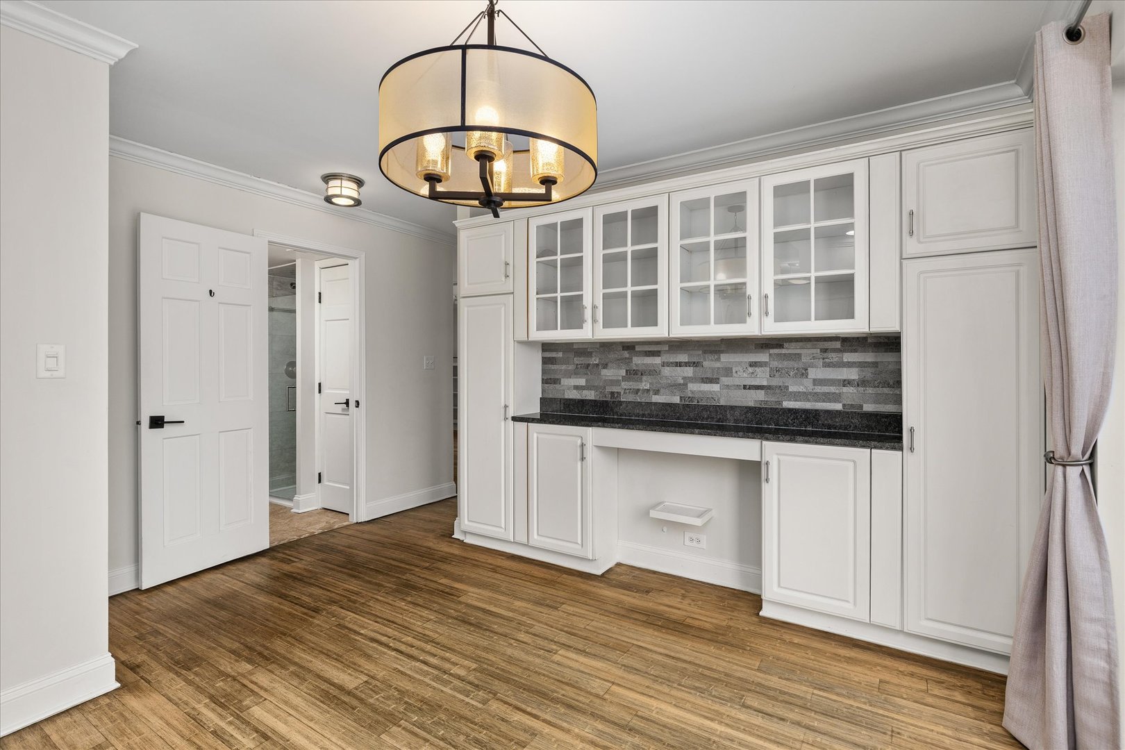 7610 West 26th Street, Unit 6 North Riverside, IL 60546 - Photo 7 of 21 a view of an empty room with a chandelier