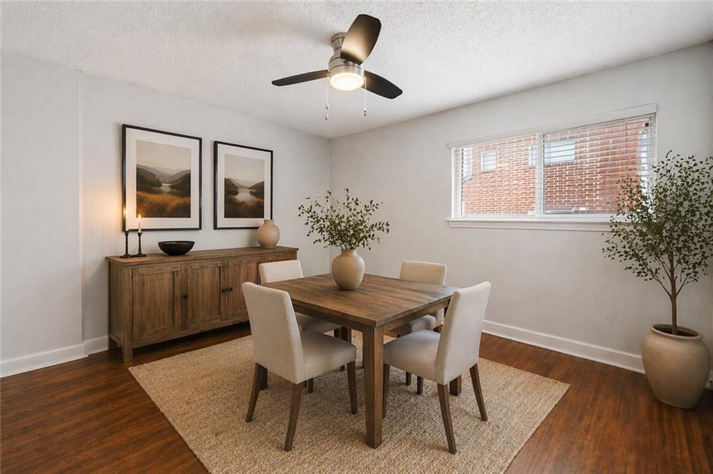 383 Ralph McGill Boulevard Northeast, Unit J Atlanta, GA 30312 - Photo 13 of 33 a dining room with furniture and window