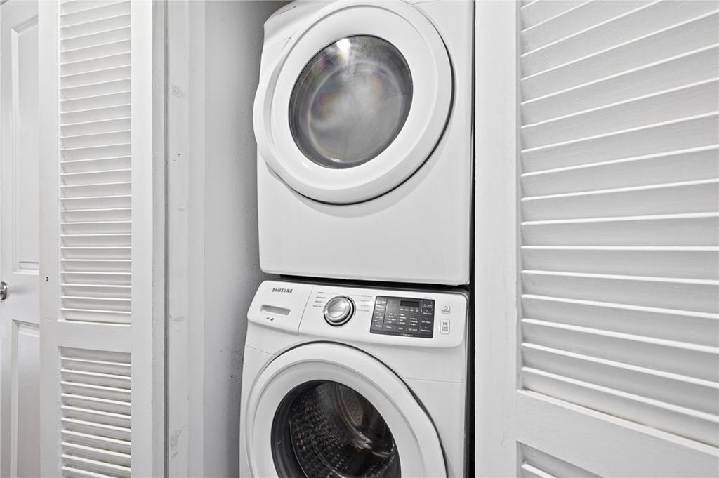 383 Ralph McGill Boulevard Northeast, Unit J Atlanta, GA 30312 - Photo 24 of 33 a close up view of a washer and dryer