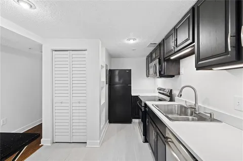 a view of room with hardwood floor and window
