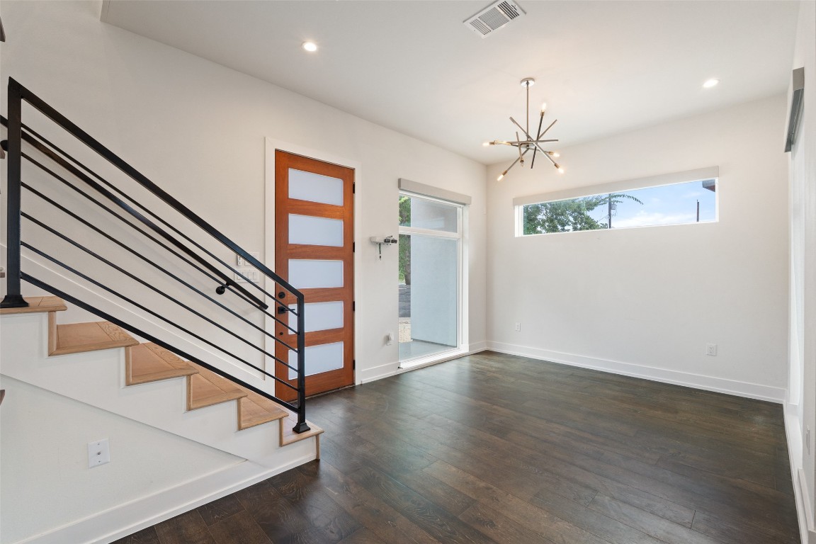 108 Tillery Street, Unit 1 Austin, TX 78702 - Photo 3 of 26 a view of an entryway with wooden floor