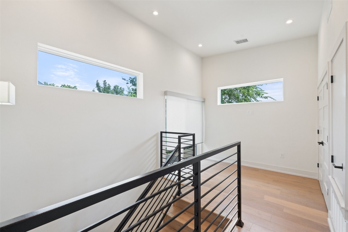 108 Tillery Street, Unit 1 Austin, TX 78702 - Photo 8 of 26 a view of a hallway with wooden floor