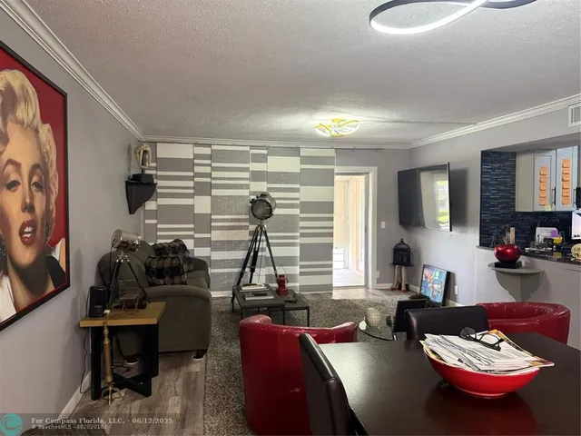 a view of a workspace with furniture