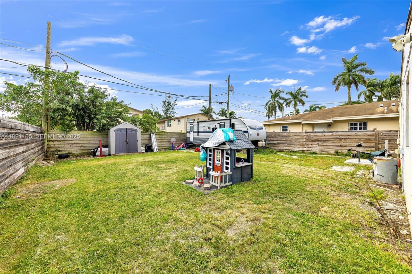 110 Northeast 9th Court Homestead, FL 33030 - Photo 25 of 26 a view of a swimming pool with a patio