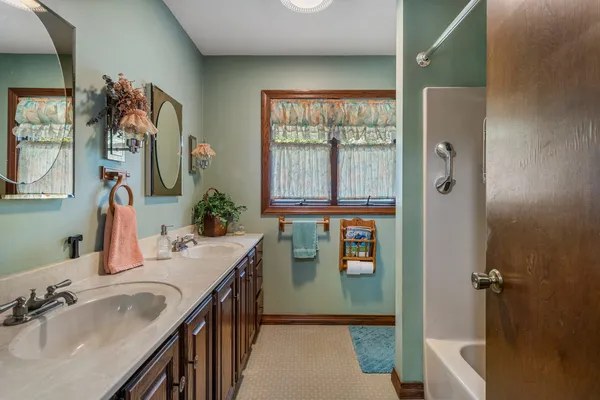 a view of a room with workspace and window