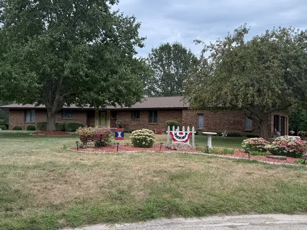 a view of backyard and outdoor kitchen