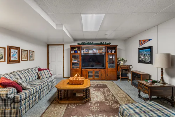 a view of a patio with table and chairs with wooden floor