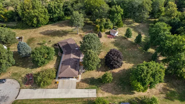 a view of a yard in front of house