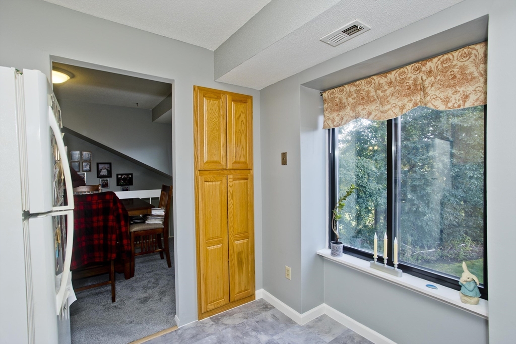 65 Nassau Drive, Unit 65 Springfield, MA 01129 - Photo 17 of 32 a view of walk in closet with clothes and shoes