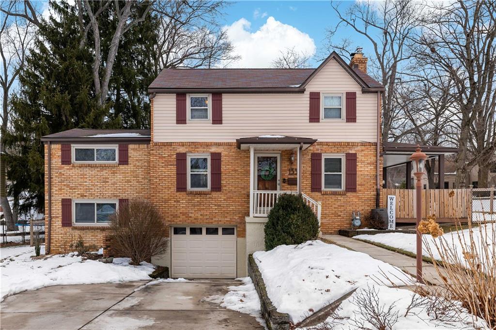 133 Cambridge Road Bethel Park, PA 15102 - Photo 1 of 43 a view of a yard in front of a house