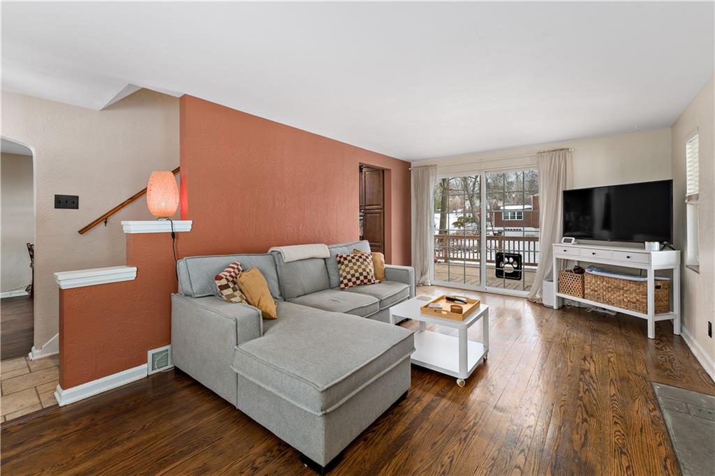 133 Cambridge Road Bethel Park, PA 15102 - Photo 11 of 43 a living room with furniture and a flat screen tv