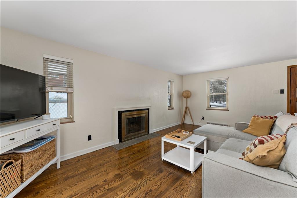 133 Cambridge Road Bethel Park, PA 15102 - Photo 12 of 43 a living room with furniture and a flat screen tv