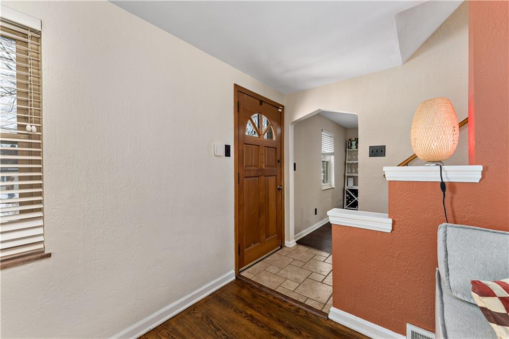 133 Cambridge Road Bethel Park, PA 15102 - Photo 8 of 43 a view of a livingroom with wooden floor