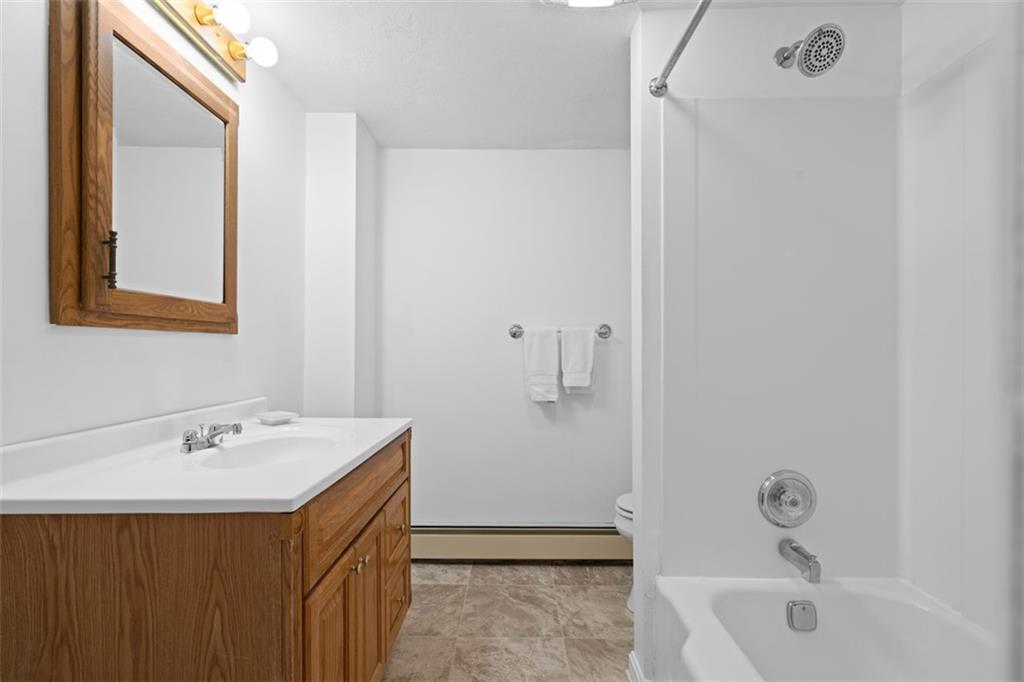 54 Price Road Presto, PA 15142 - Photo 22 of 46 a bathroom with a sink and a mirror