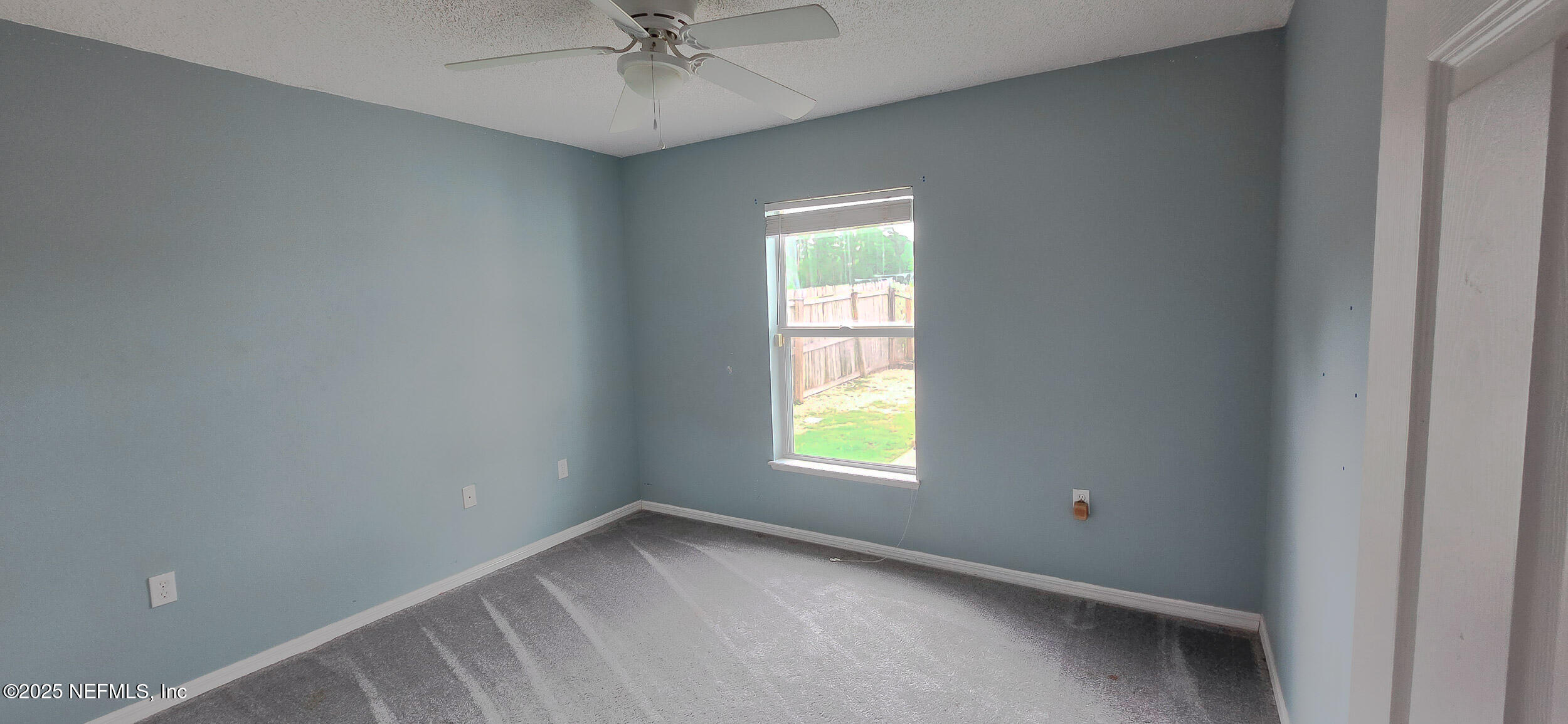 3228 Talisman Drive Middleburg, FL 32068 - Photo 14 of 29 an empty room with a window