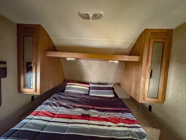 a view of a backyard with large trees