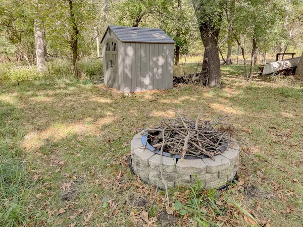 a house view with a backyard space