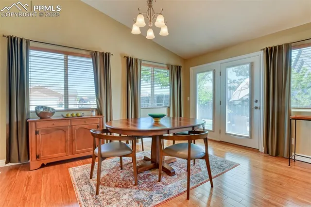 a view of a livingroom with furniture window and outside view