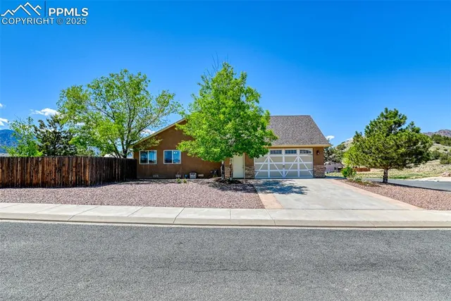 a house with yard in front of it