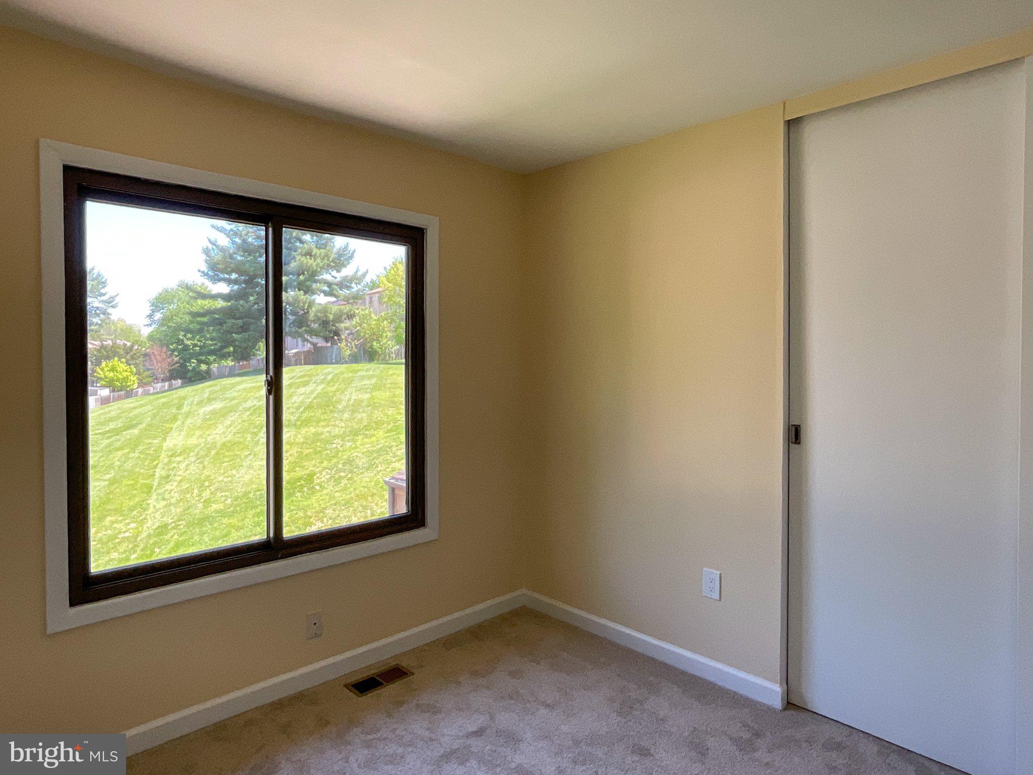 9040 Centerway Road Gaithersburg, MD 20879 - Photo 39 of 45 Bright room with serene views outside.